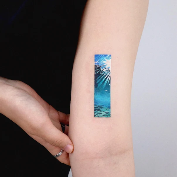 Watercolor Ocean, Underwater tattoo on Forearm