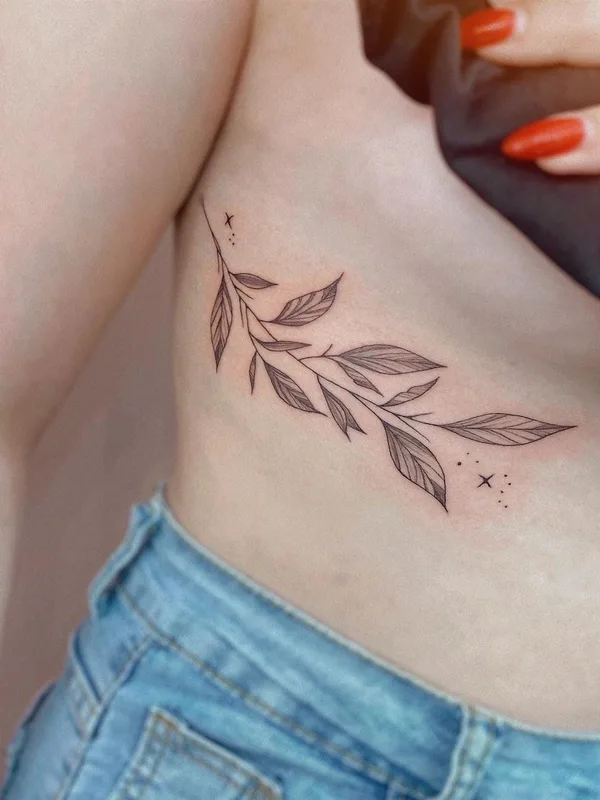 female black and grey fineline Tatuaggio su ribcage #51310 | Tatuatore Крыло Татьяна