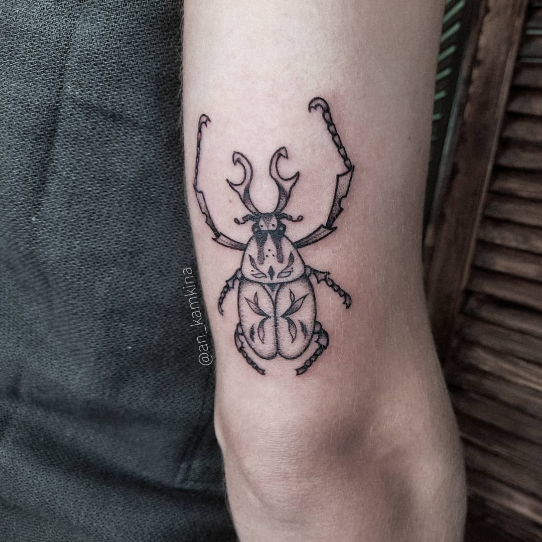 dotwork and linework beetle tattoo Ilya Brezinski