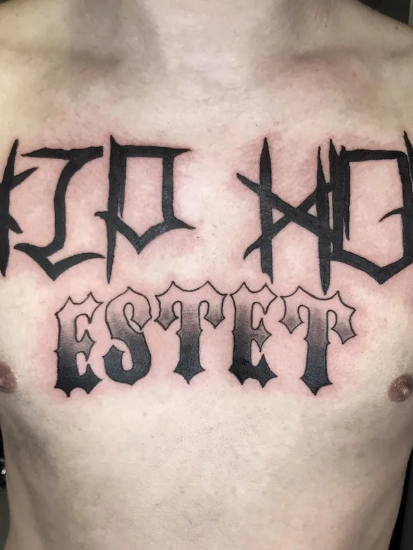 male black lettering 纹身 在 chest #52820 | 纹身师 Игорь Поульсен