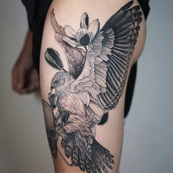 Black & Grey Bird, Skull tattoo on Thigh