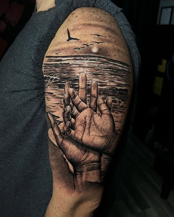 Realism Hands, Ocean tattoo on Upper Arm