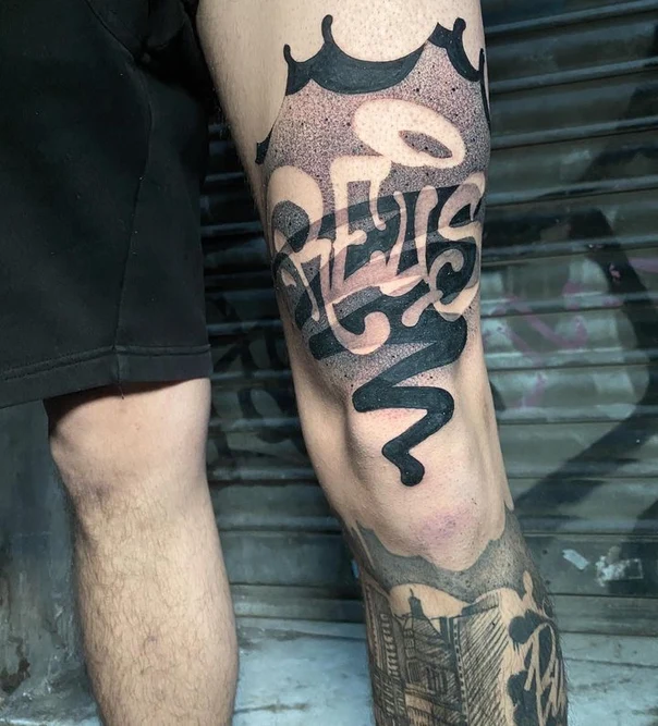 Blackwork Lettering tattoo on Knee