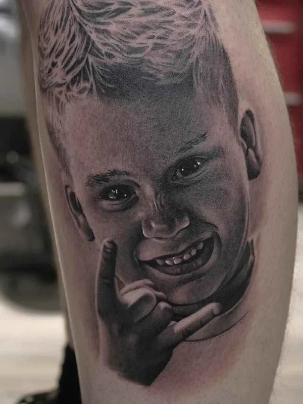 black and grey realism 纹身 在 calf #8968 | 纹身师 Ryan Evans