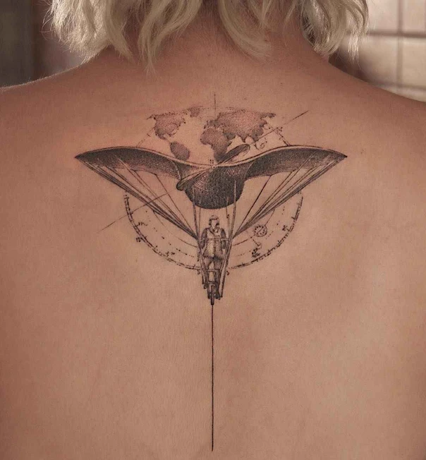 Sketch World map, Flying machine tattoo on Upper Back