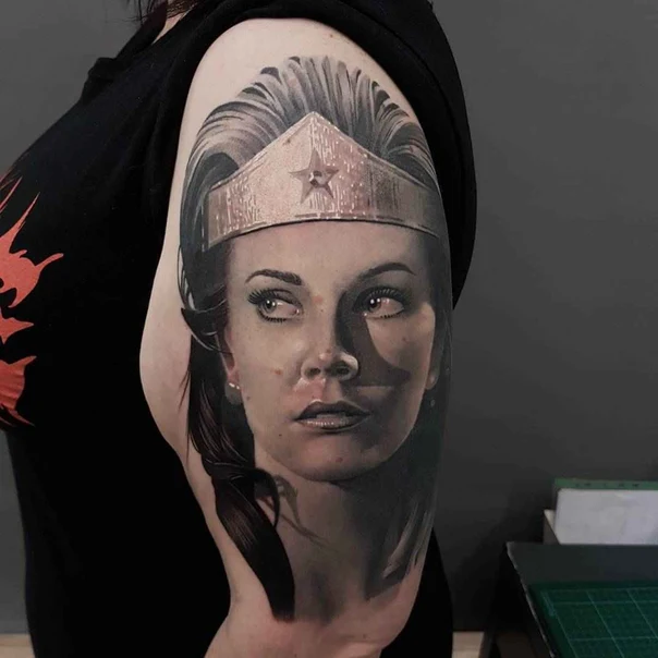 Realism Portrait, Wonder woman tattoo on Upper Arm