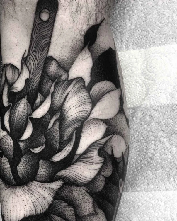 Blackwork Flower, Feather tattoo on Forearm