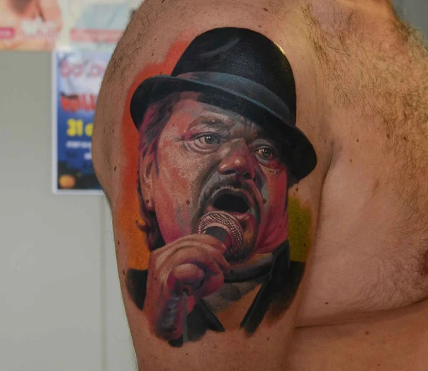 Realism Portrait, Microphone tattoo on Upper Arm