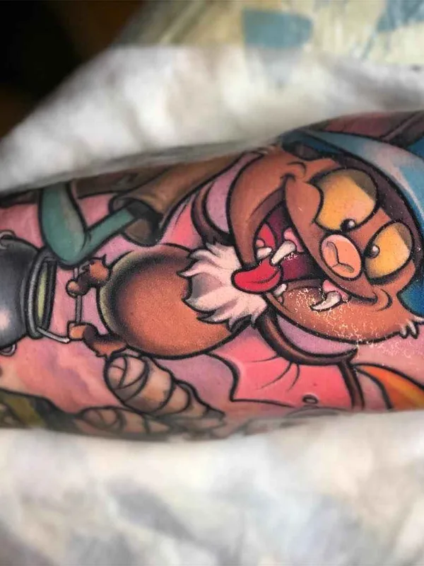 color cartoon tatuaje en forearm #17776 | Tatuador Thom Bulman