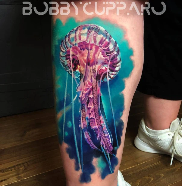 Watercolor Jellyfish tattoo on Thigh
