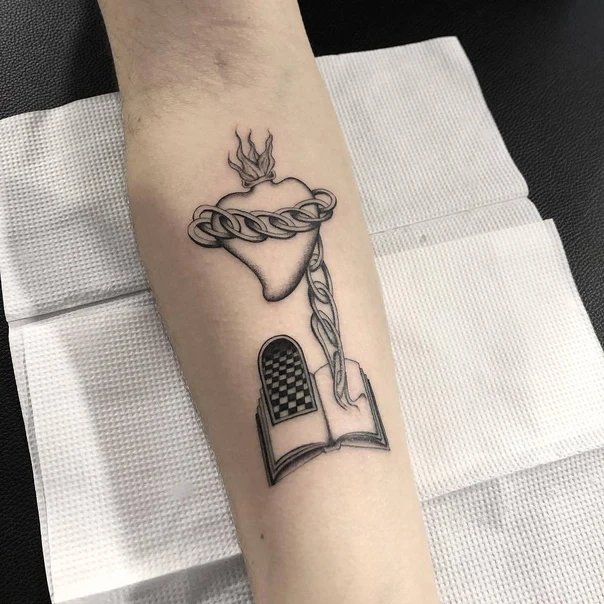 Blackwork Heart, Book tattoo on Forearm