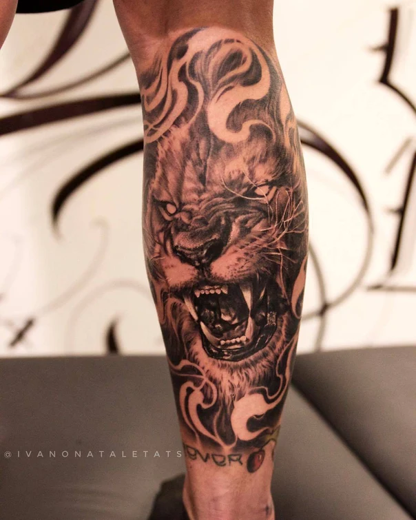 Realism Lion tattoo on Calf