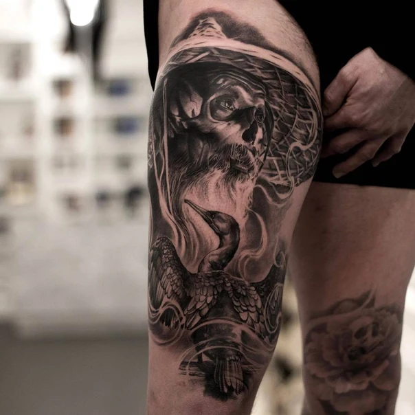 Realism Skull, Bird tattoo on Thigh