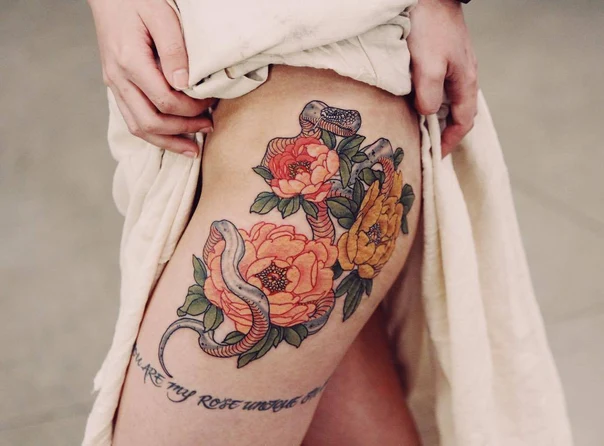 Illustrative Snake, Flowers tattoo on Thigh
