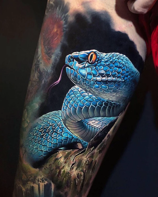 Realism Snake tattoo on Forearm