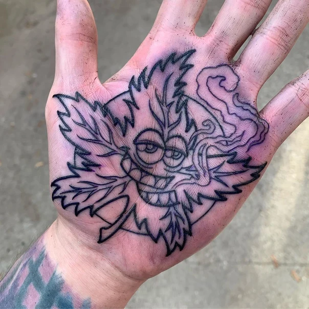 Cartoon Leaf, Face tattoo on Palm