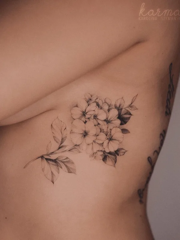 female black botanic Tatuaggio su side #35535 | Tatuatore Karolina Szymańska