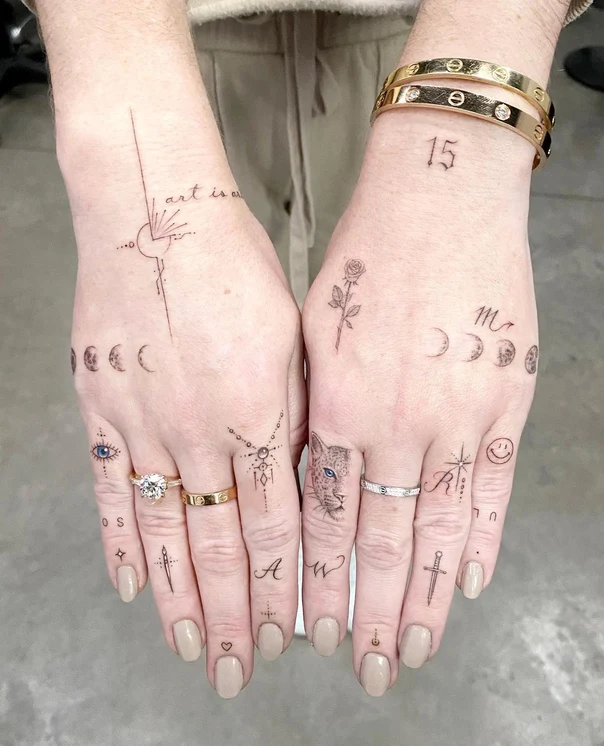 Fineline Moon phases, Rose tattoo on Hand