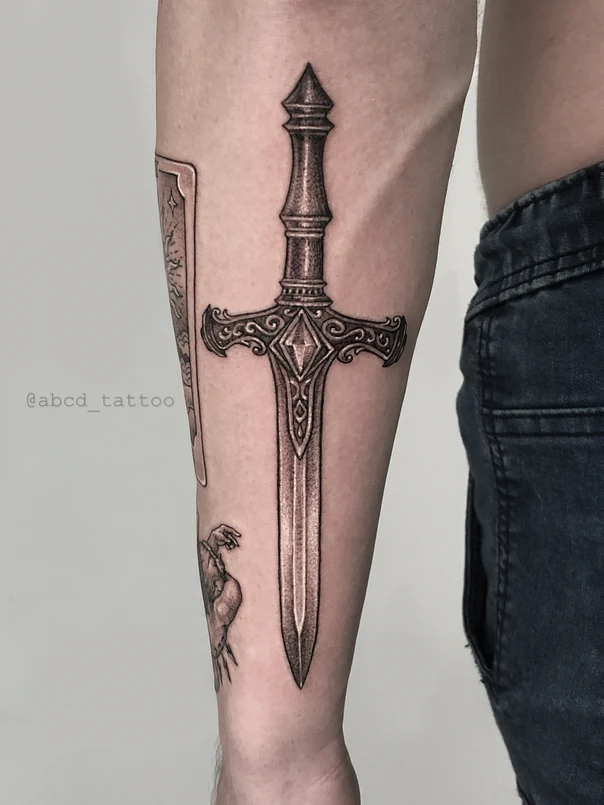 Blackwork Sword tattoo on Forearm