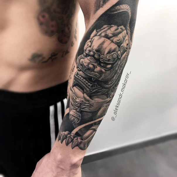Black & Grey Lion, Mythical creature tattoo on Forearm