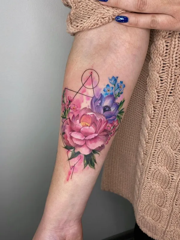 female color watercolor tattoo auf forearm #52920 | Tätowierer Kristina Borovkova
