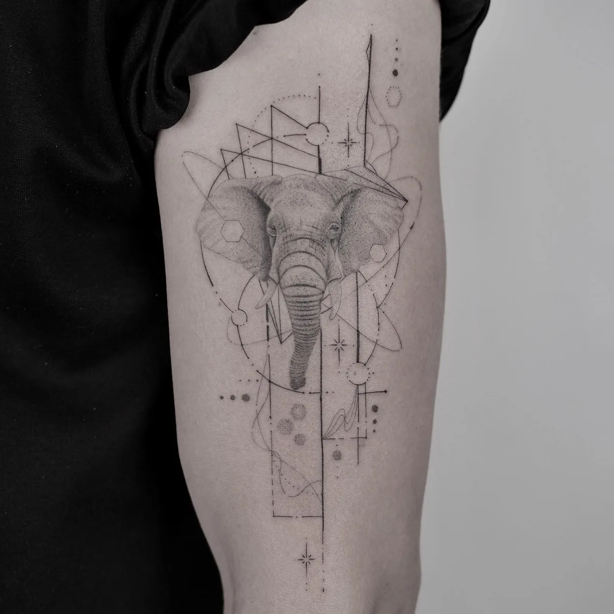 Original tattoo with geometric shapes by Misha Nechaev