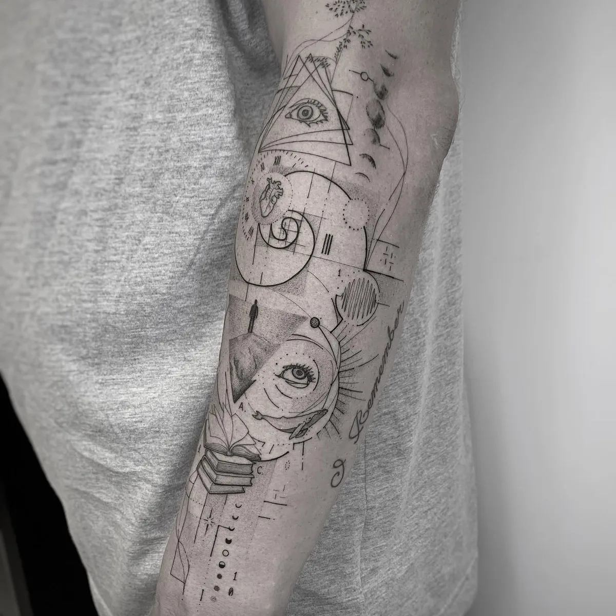 Mysterious plots in geometric tattoo by Misha Nechaev