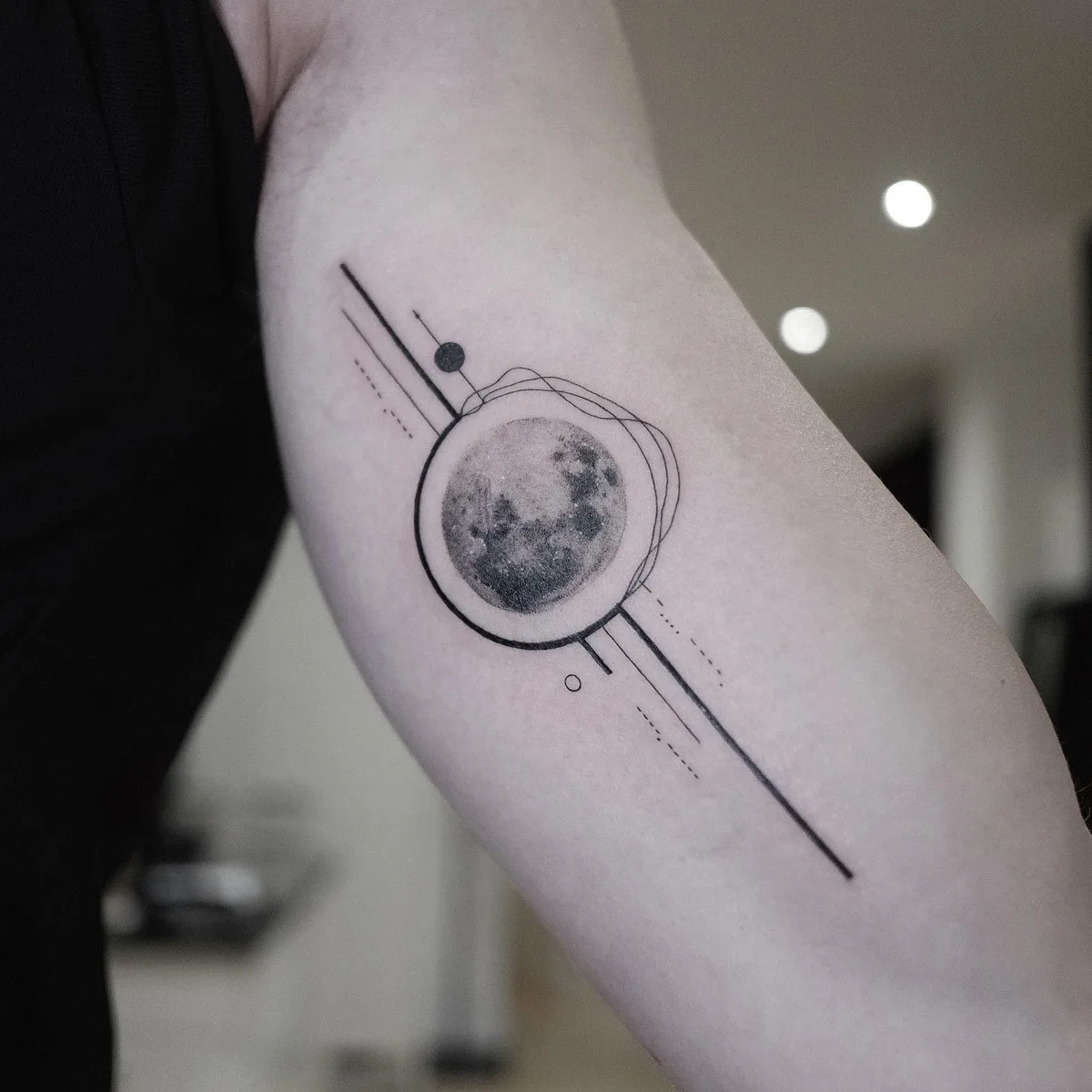 Tattoo by Misha Nechaev with thin lines and geometry
