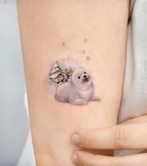 Realism Seal, Snow tattoo on Forearm