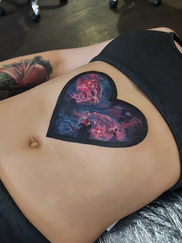 female color watercolor Tatuaggio su stomach #53327 | Tatuatore Vic Nikkarinen
