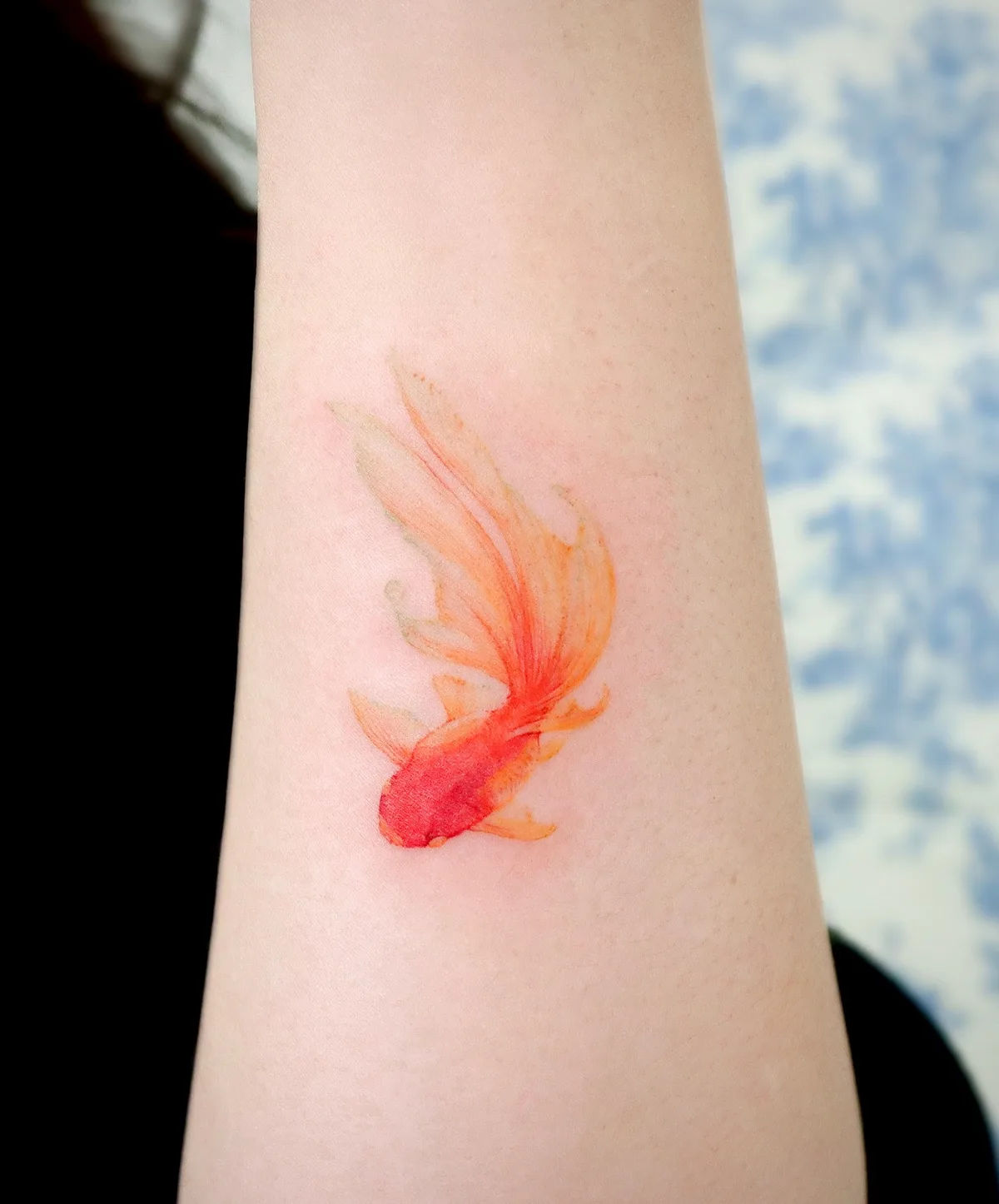 Miniature goldfish tattoo
