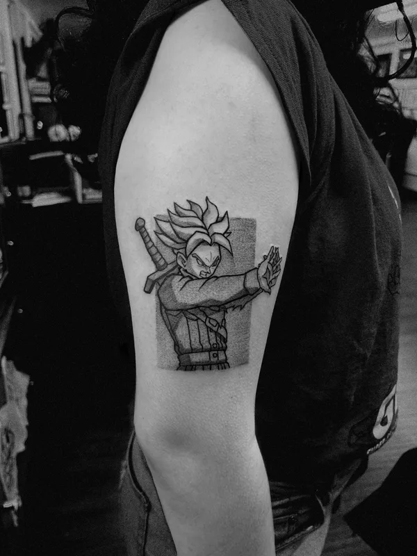 black and grey anime tattoo on upper arm #53372 | Tattoo Artist Cazr Killz