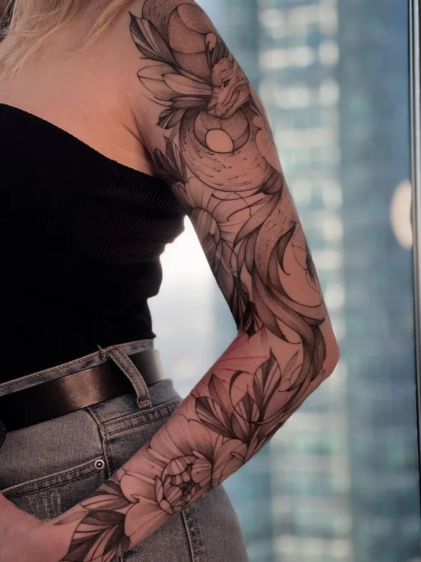female black and grey blackwork tattoo on full sleeve #53394 | Tattoo Artist Варвара Романчук