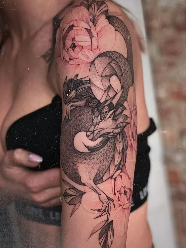 female black and grey illustrative tattoo on upper arm #53396 | Tattoo Artist Варвара Романчук
