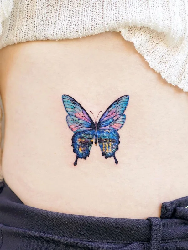 female color miniature tattoo on side #53434 | Tattoo Artist Tilda Tattoo