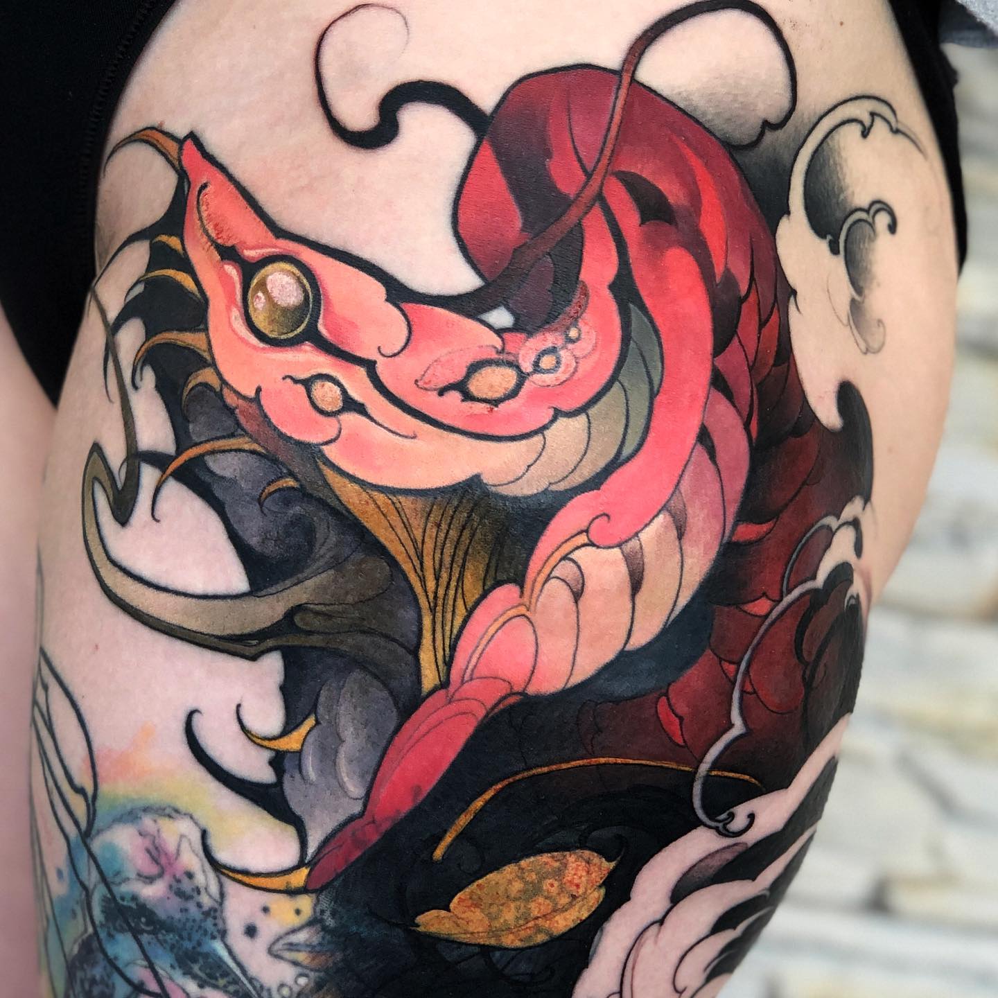 Neo-traditional tattoo by Kenni Poke