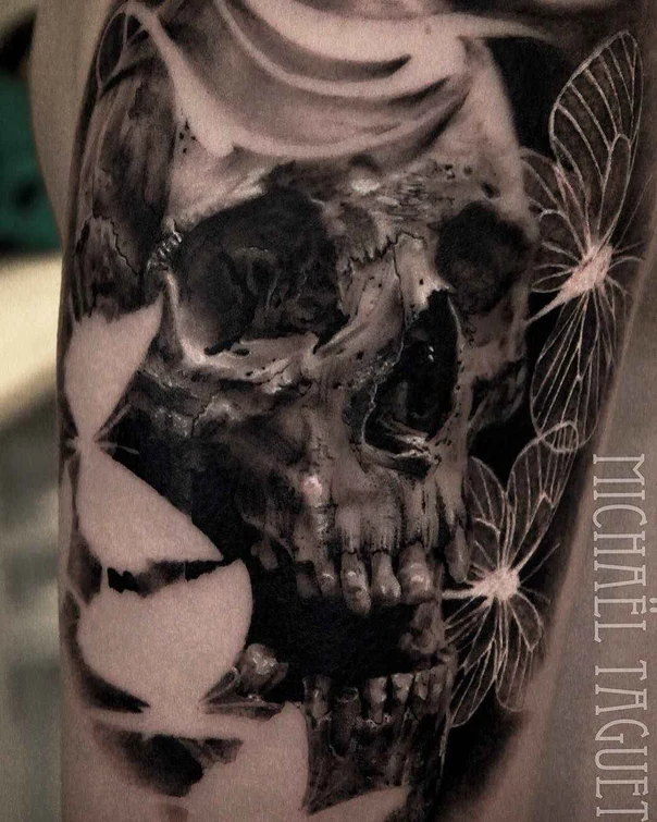 Realism Skull, Butterfly tattoo on Upper Arm