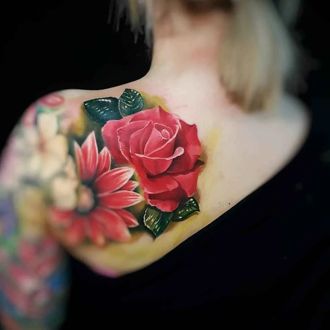 Tattoo artist Marek Marzan Pawlik color, realistic tattoo, bird, flower