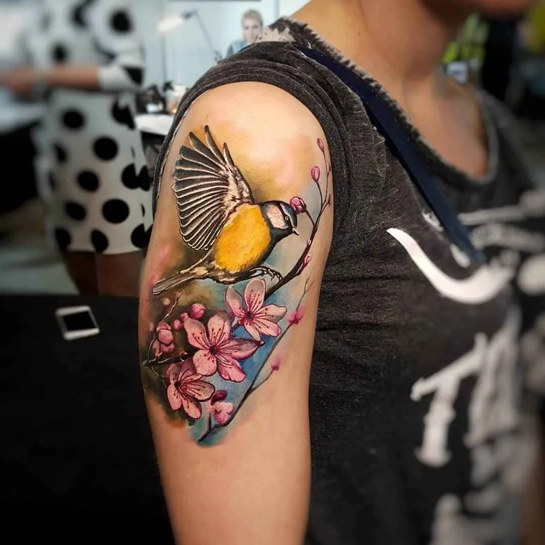 Tattoo artist Marek Marzan Pawlik color, realistic tattoo, bird, flower