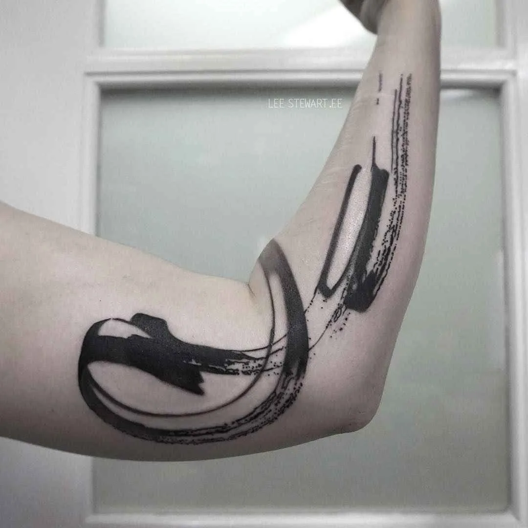 Tattoo artist Lee Stewart blackwork abstract tattoo in auhors brushstroke style | London