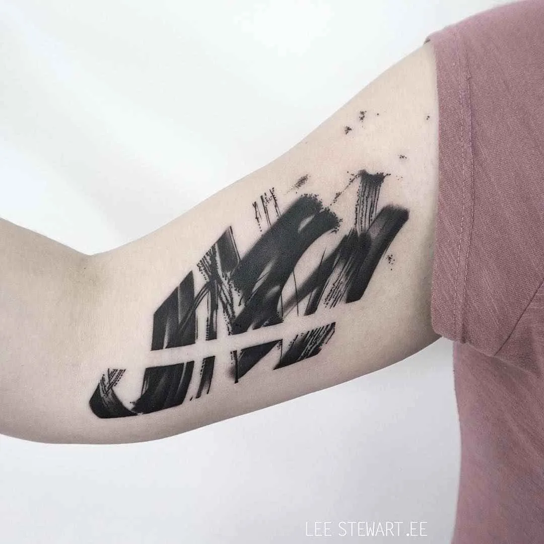 Tattoo artist Lee Stewart blackwork abstract tattoo in auhors brushstroke style | London