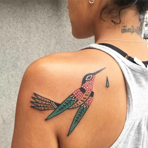 Illustrative Hummingbird tattoo on Shoulder Blade