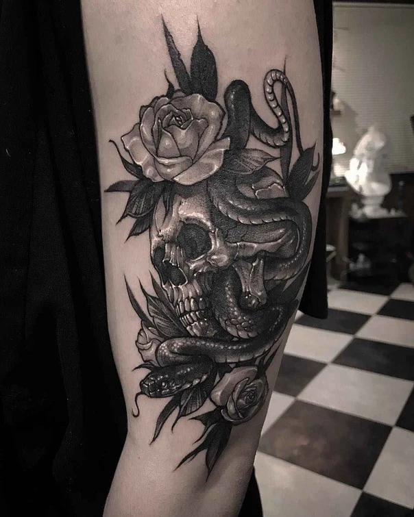 Black & Grey Skull, Snake tattoo on Upper Arm