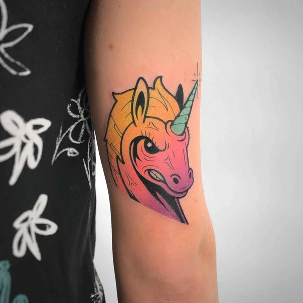 New School Unicorn tattoo on Forearm