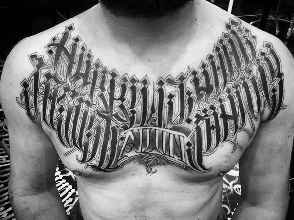 Lettering Lettering tattoo on Chest