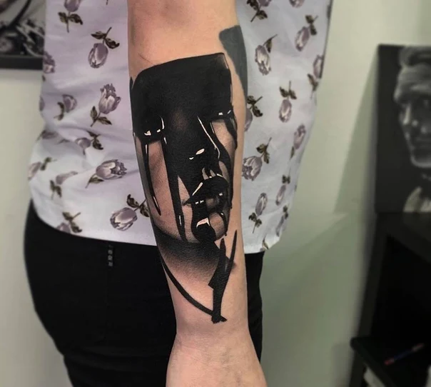 Blackwork Face, Abstract tattoo on Forearm