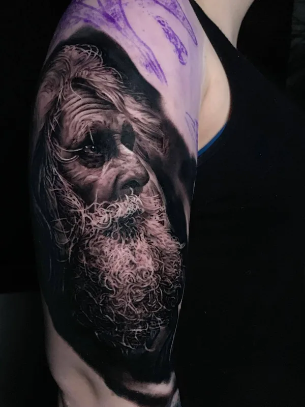 black and grey realism tattoo on upper arm #29895 | Tattoo Artist Michael Perry
