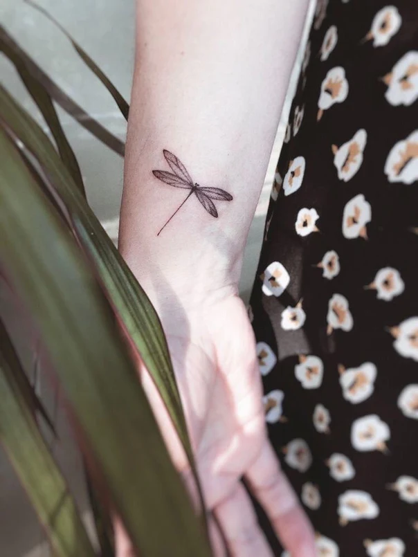 Fineline Dragonfly tattoo on Wrist
