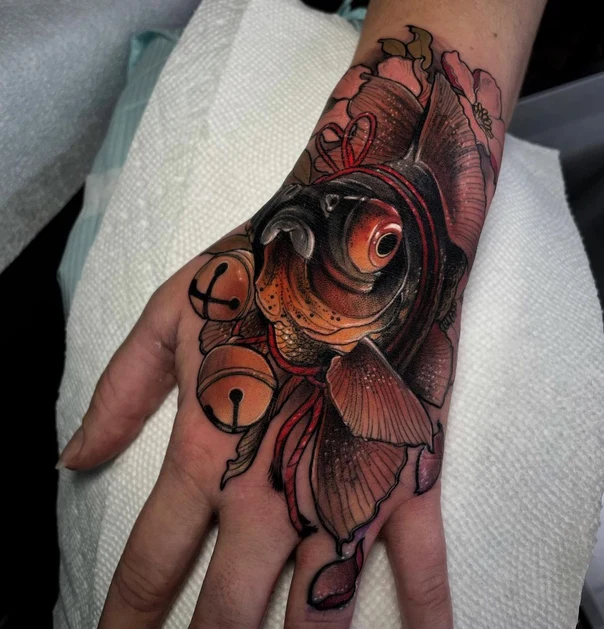 Japanese Fish, Bells tattoo on Back of Hand