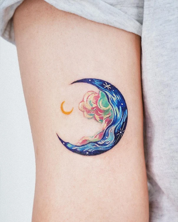 Illustrative Moon, Cloud tattoo on Upper Arm